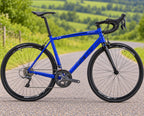 Bicicleta de ruta GW Flamma color azul polish, Shimano Claris 16 velocidades