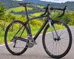 Bicicleta de ruta GW Flamma color negro verde limón, Shimano Claris 16 velocidades